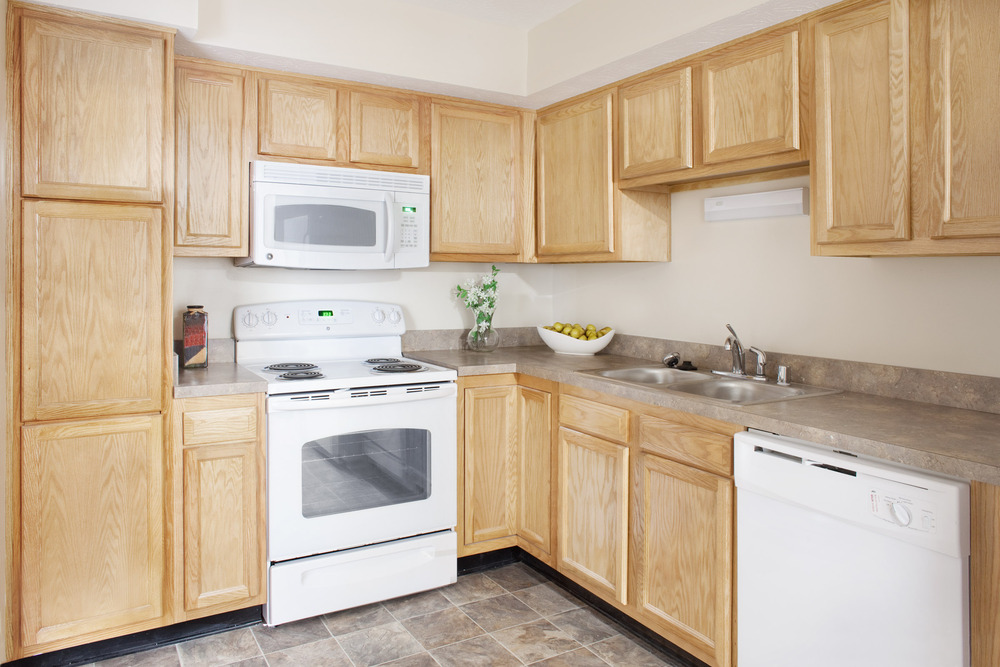 kitchen Kompact whole kitchen cabinets blonde color.