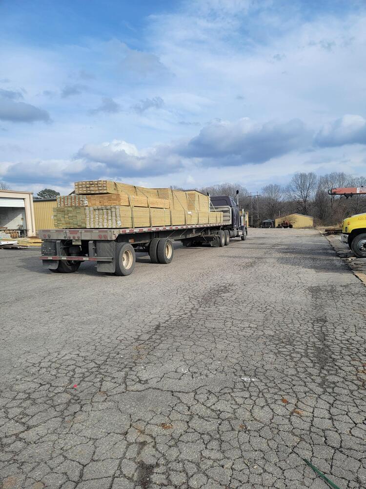 Truck full of lumber.