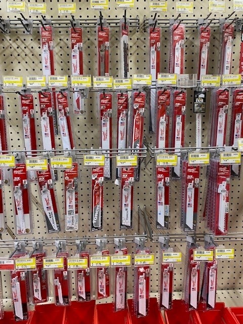 Milwaukee brand sawzall blade display.