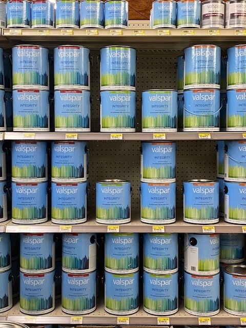 Valspar paint can display.